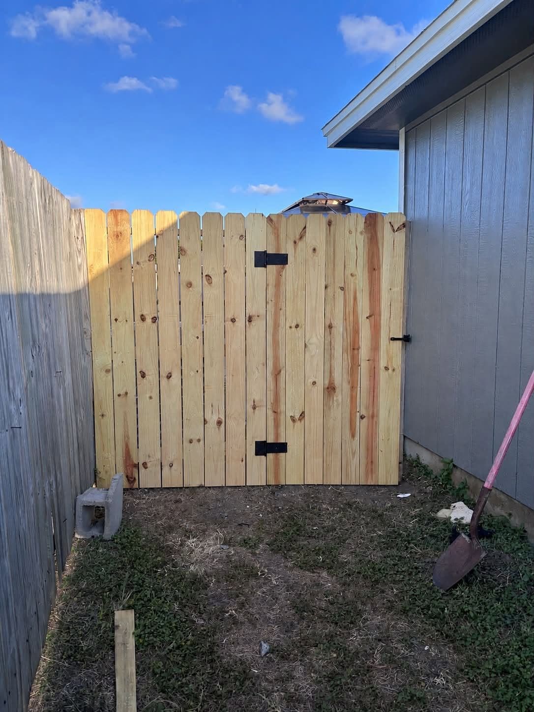 Wood fence gate installation by Big Dawg Fence Company in Corpus Christi